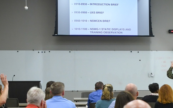 Commander, NSWC, briefs APEX Attendees