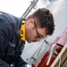 USS Ralph Johnson conducts paint preservation.