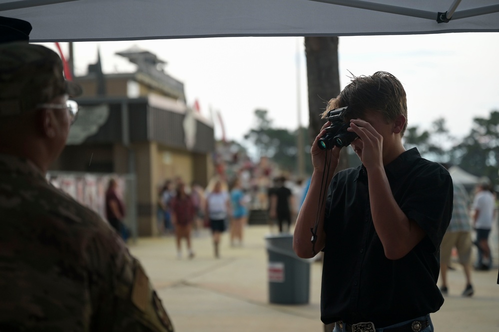 Airmen fly over and join FWB, Navarre Friday night football games >  Hurlburt Field > Article Display