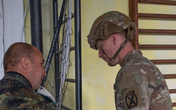 Soldiers from 10th Mountain Division and Bulgarian Land Forces 101st Alpine Regiment participate in the Rhodope 23 climbing techniques and fundamentals on Sep. 16, 2023, near Smolyan, Bulgaria
