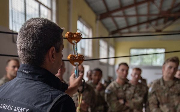 Soldiers from 10th Mountain Division and Bulgarian Land Forces 101st Alpine Regiment participate in the Rhodope 23 climbing techniques and fundamentals on Sep. 16, 2023, near Smolyan, Bulgaria