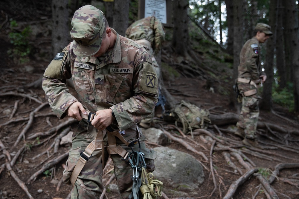 Soldiers from 10th Mountain Division and Bulgarian Land Forces 101st Alpine Regiment participate in the Rhodope 23 mountain movement technique in high-angle terrain event on Sep. 18, 2023, near Smolyan, Bulgaria