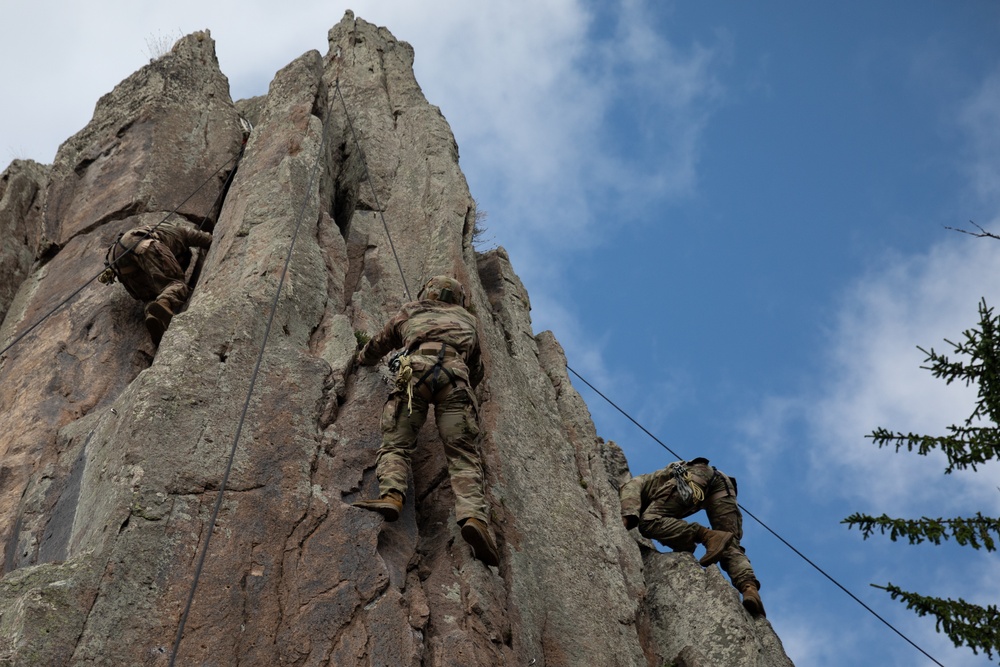 Soldiers from 10th Mountain Division and Bulgarian Land Forces 101st Alpine Regiment participate in the Rhodope 23 mountain movement technique in high-angle terrain event on Sep. 18, 2023, near Smolyan, Bulgaria