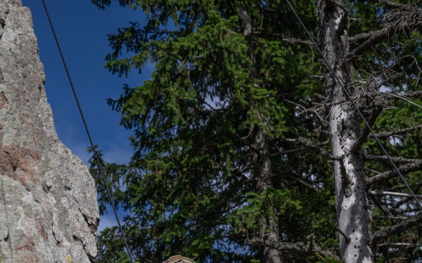 Soldiers from 10th Mountain Division and Bulgarian Land Forces 101st Alpine Regiment participate in the Rhodope 23 mountain movement technique in high-angle terrain event on Sep. 18, 2023, near Smolyan, Bulgaria