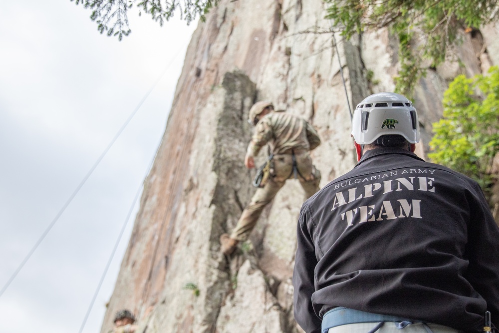 Soldiers from 10th Mountain Division and Bulgarian Land Forces 101st Alpine Regiment participate in the Rhodope 23 mountain movement technique in high-angle terrain event on Sep. 18, 2023, near Smolyan, Bulgaria