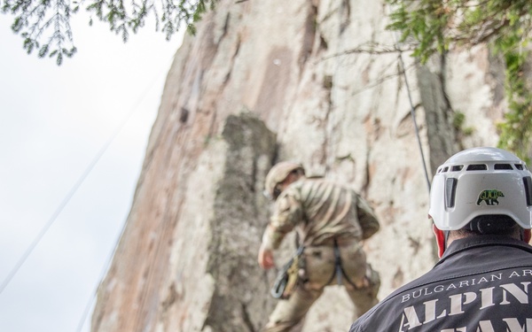 Soldiers from 10th Mountain Division and Bulgarian Land Forces 101st Alpine Regiment participate in the Rhodope 23 mountain movement technique in high-angle terrain event on Sep. 18, 2023, near Smolyan, Bulgaria