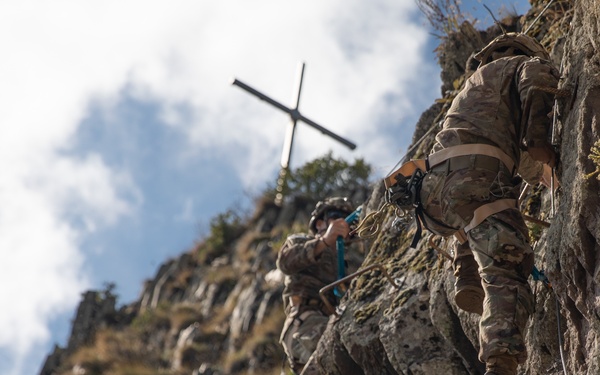 Soldiers from 10th Mountain Division and Bulgarian Land Forces 101st Alpine Regiment participate in the Rhodope 23 mountain movement technique in high-angle terrain event on Sep. 18, 2023, near Smolyan, Bulgaria