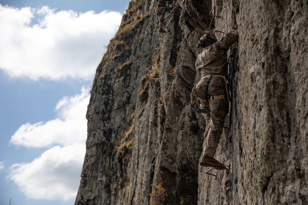 Soldiers from 10th Mountain Division and Bulgarian Land Forces 101st Alpine Regiment participate in the Rhodope 23 mountain movement technique in high-angle terrain event on Sep. 18, 2023, near Smolyan, Bulgaria