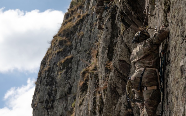 Soldiers from 10th Mountain Division and Bulgarian Land Forces 101st Alpine Regiment participate in the Rhodope 23 mountain movement technique in high-angle terrain event on Sep. 18, 2023, near Smolyan, Bulgaria