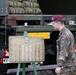 German Soldier prepares jump wings to be presented during Falcon Leap