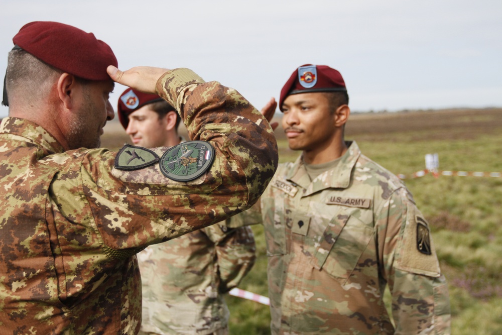 Specialist Joshua Stevenson solutes after receiving foreign jump wings