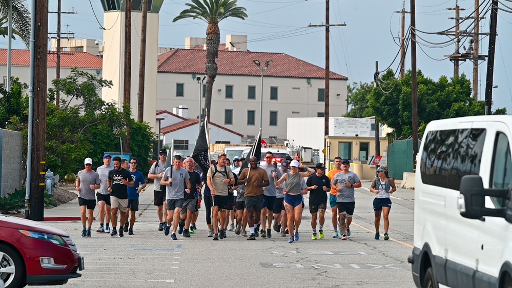 Coast Guard and participants run for Memorial POW-MIA Torch Run in San Pedro