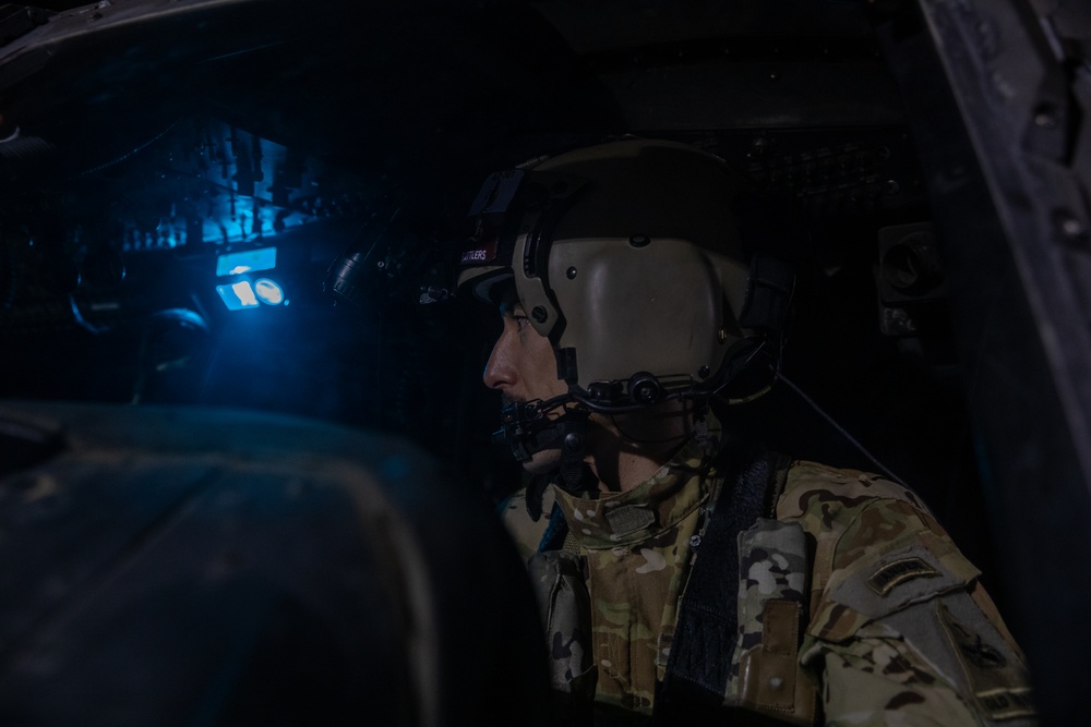 U.S. Army Pilot conducts pre-flight checks