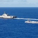 Unmanned Surface Vessels Steam Alongside USS Gabrielle Giffords