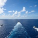 Unmanned Surface Vessels Steam Alongside USS Gabrielle Giffords