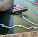 Coast Guard performs CPR on a man after a crane collapse near Memphis, Tennessee.