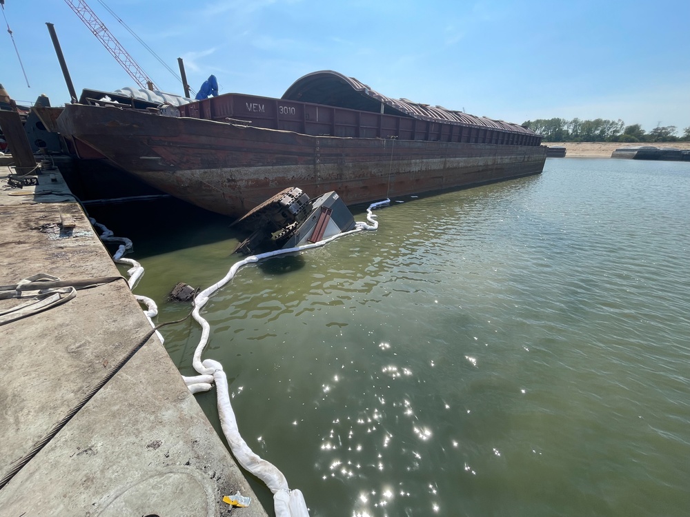 A crane sits in the water at Wepfer Marine Drydock Sept. 19, 2023, near Memphis, Tennessee. The crane reportedly collapsed into the water with one crane operator inside who was later rescued from the water.