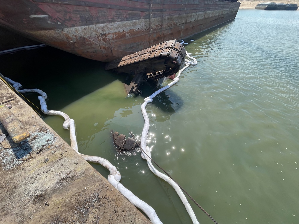 Coast Guard performs CPR on a man after a crane collapse near Memphis, Tennessee.