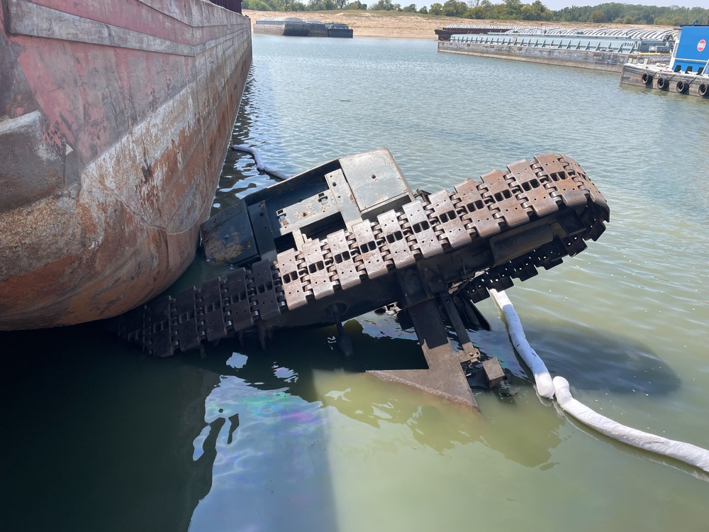 Coast Guard performs CPR on a man after a crane collapse near Memphis, Tennessee.