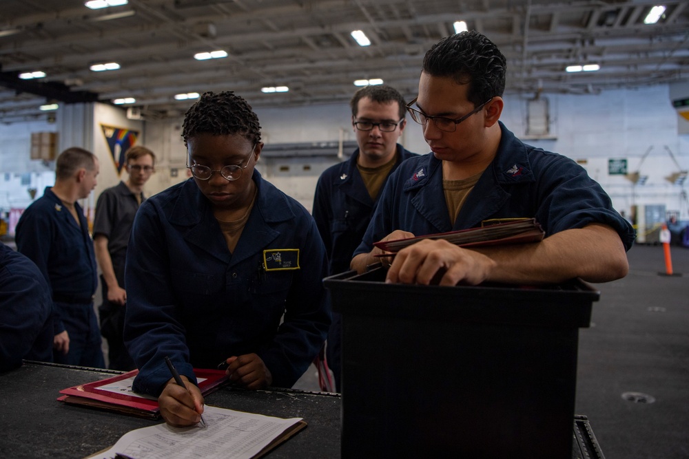 Sailors Collect Folders