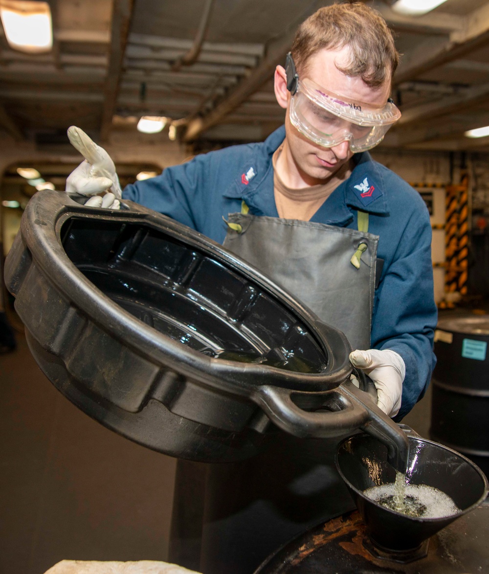 Sailor Pours Fuel