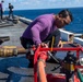 Sailor Checks Fuel Hoses