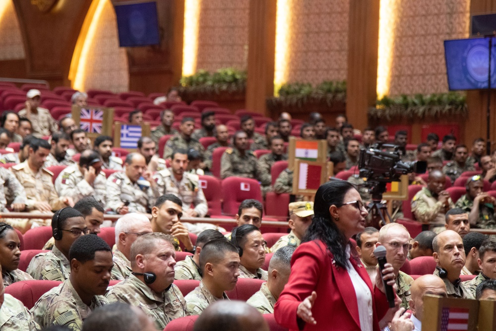 Key leader engagement specialist and senior cultural advisor for U.S. Central Command, asks the panelists a question regarding one of the various topics during exercise Bright Star 2023