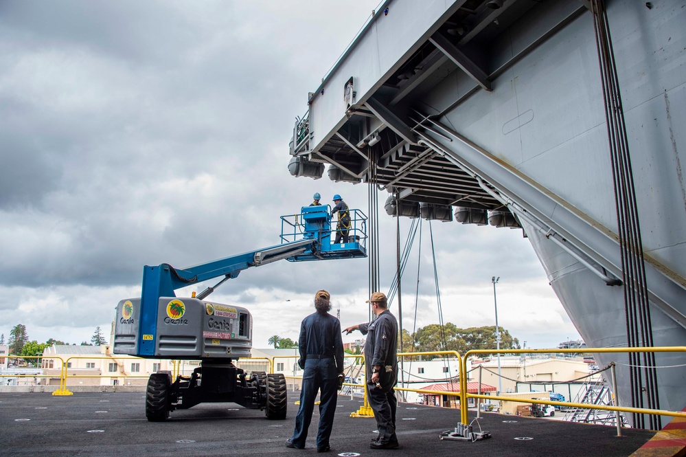 Sailors Perform Maintenance on Elevator Cables Aboard USS Carl Vinson (CVN 70)