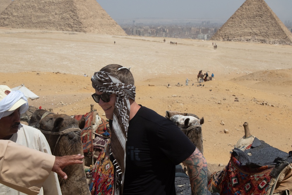 U.S. Army Capt. Luke Jean, a public affairs officer from U.S. Army Central Command, is greeted by locals during cultural day during exercise Bright Star 23 at Giza
