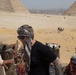 U.S. Army Capt. Luke Jean, a public affairs officer from U.S. Army Central Command, is greeted by locals during cultural day during exercise Bright Star 23 at Giza