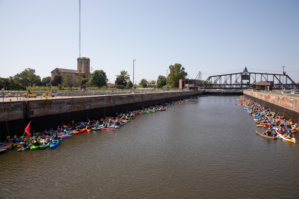 Hundreds of Paddlers Pass through Lock and Dam