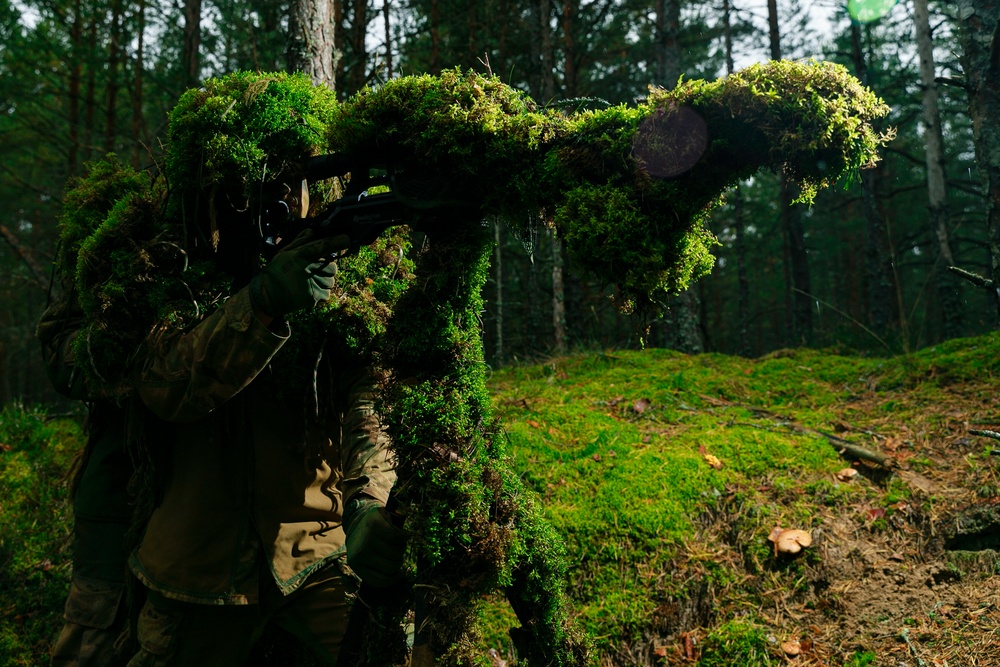 Task Force Marne sharpshooter teams conduct sniper field craft during Silver Arrow