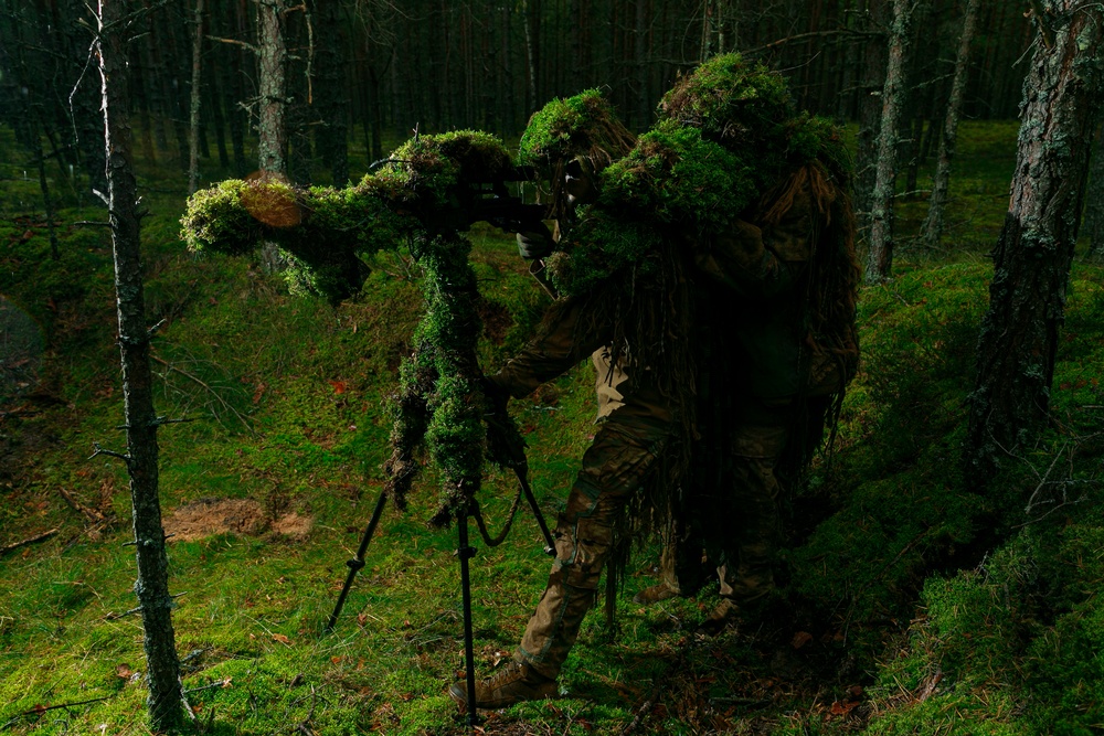 Task Force Marne sharpshooter teams conduct sniper field craft during Silver Arrow