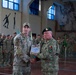 Romanian Brig. Gen. Ilie-Marian Dragomir recognizes U.S. Army Staff Sgt. Joseph Halter for winning first place in the hand grenade employment lane