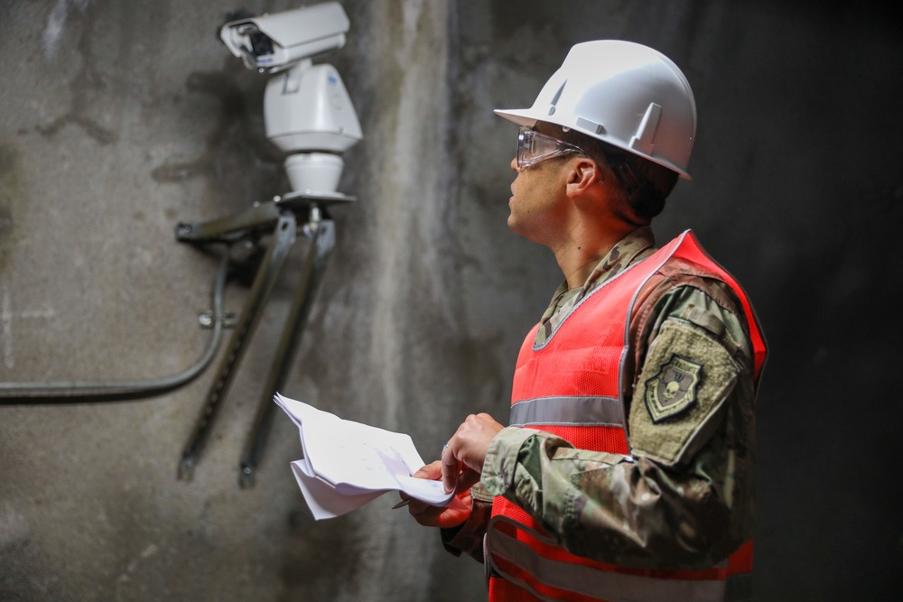 Joint Task Force-Red Hill personnel, apply tamper seal at the Red Hill Bulk Fuel Storage Facility