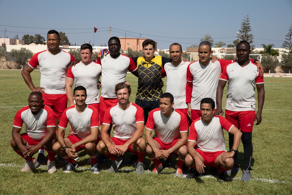 Soldiers from multiple countries play in an organized “African Lion” soccer game