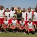 Soldiers from multiple countries play in an organized “African Lion” soccer game