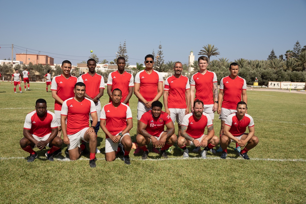 Soldiers from multiple countries play in an organized “African Lion” soccer game