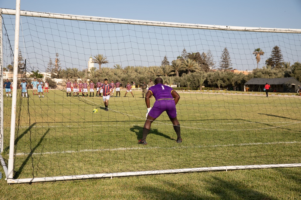 Soldiers from multiple countries play in an organized “African Lion” soccer game