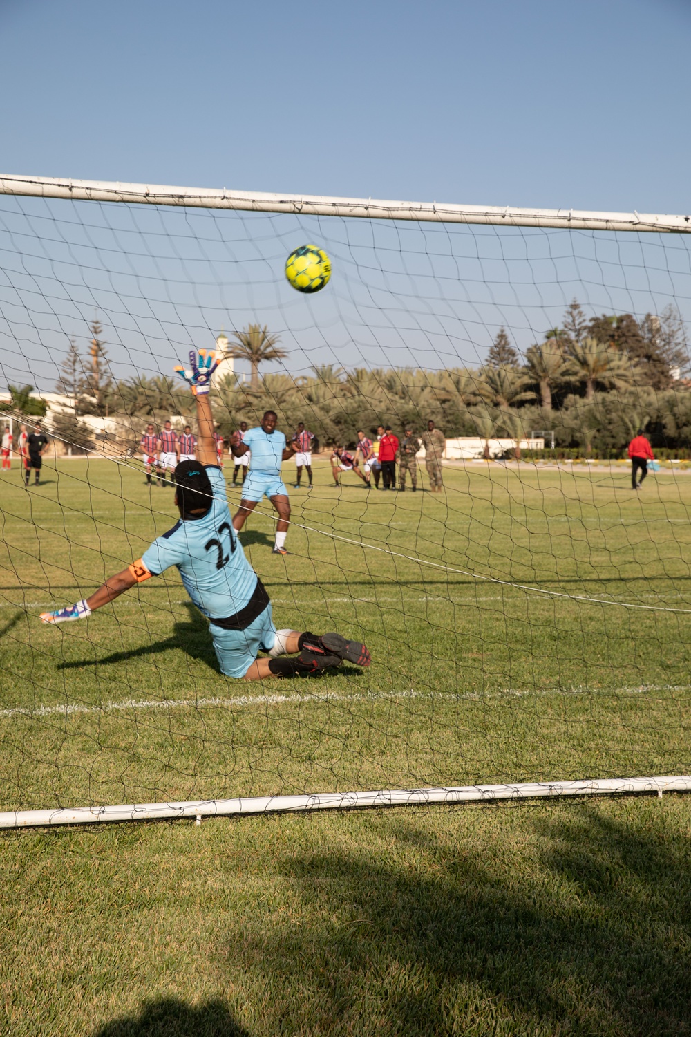 Soldiers from multiple countries play in an organized “African Lion” soccer game