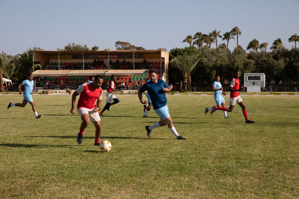 Soldiers from multiple countries play in an organized “African Lion” soccer game