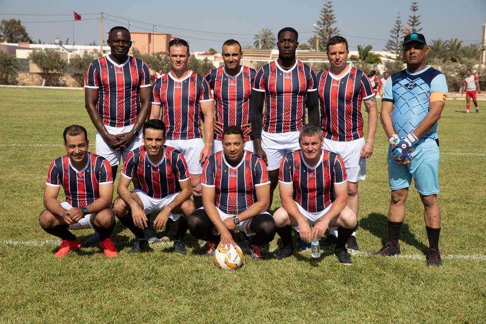 Soldiers from multiple countries play in an organized “African Lion” soccer game