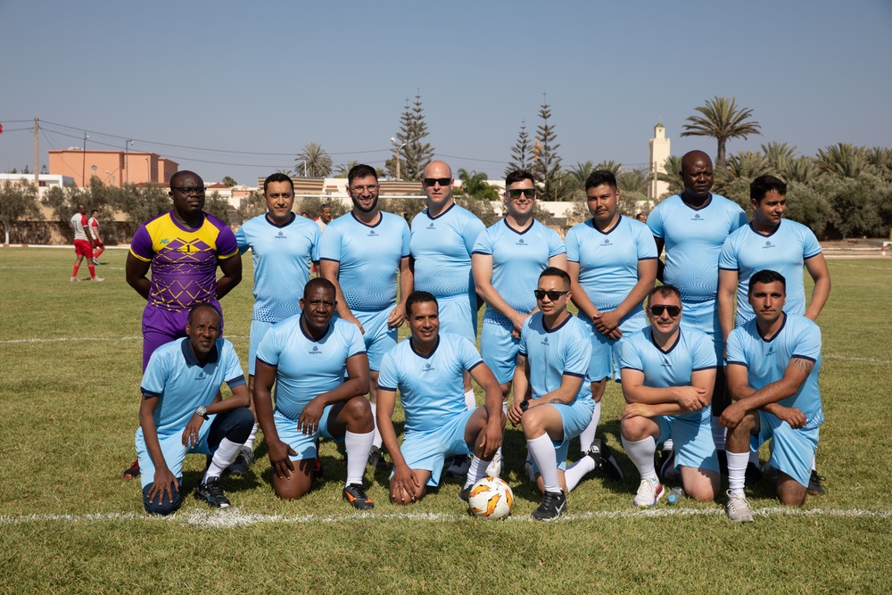 Soldiers from multiple countries play in an organized “African Lion” soccer game