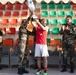 Soldiers from multiple countries play in an organized “African Lion” soccer game