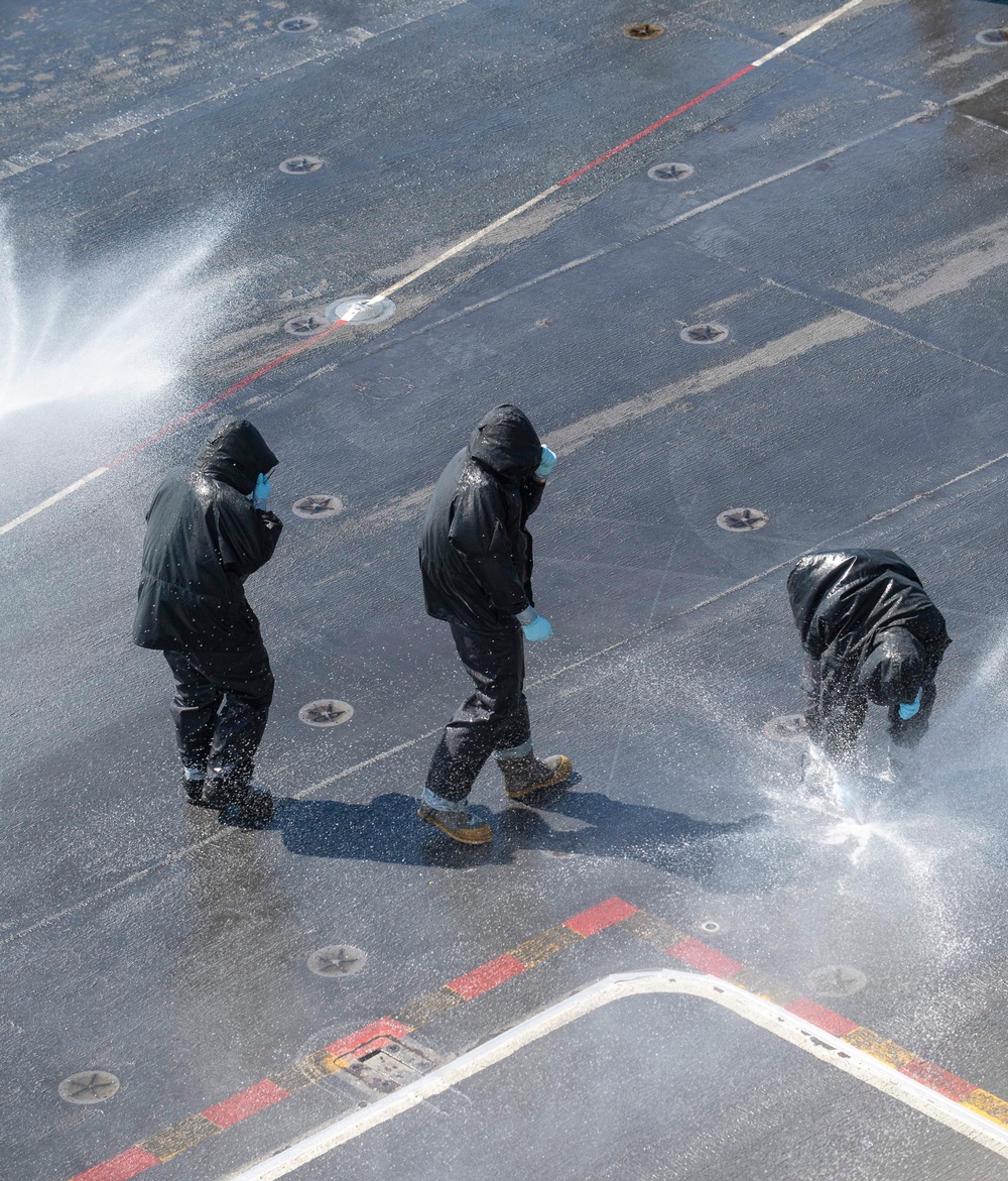 Sailors Clean Sprinklers