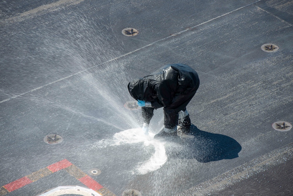 Sailor Clears Sprinkler