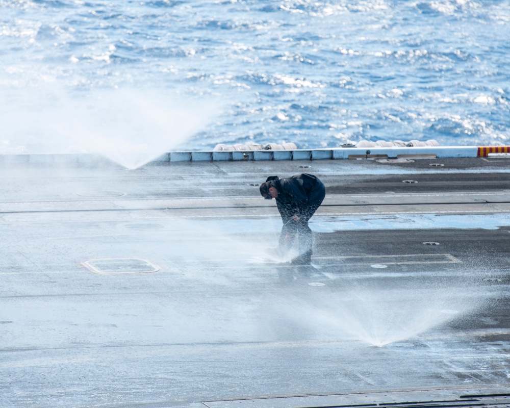 Sailor Clears Sprinkler