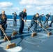 Sailors Scrub Flight Deck