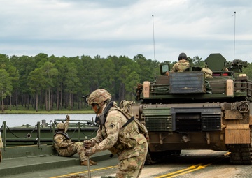 Raiders and Black Diamonds conduct wet gap crossing