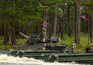 Raiders and Black Diamonds conduct wet gap crossing